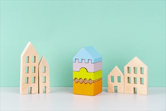 Miniature houses blue background