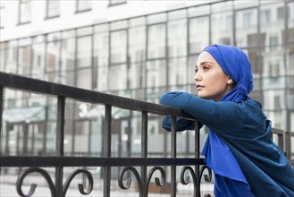 Teenager girl with hijab posing with