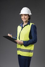 Portrait female engineer with clipboard_2