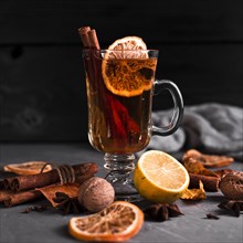 Orange cinnamon tea with black background