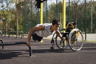 Full shot disabled man doing push ups