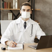Medium shot doctor wearing mask indoors