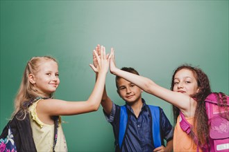 Children giving high five