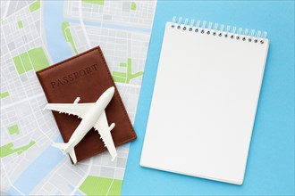 Flat lay travel items blue background