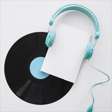 Booklet mockup with headphones vinyl
