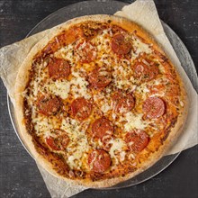 Top view pepperoni pizza tray