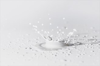 White surface with splash milk