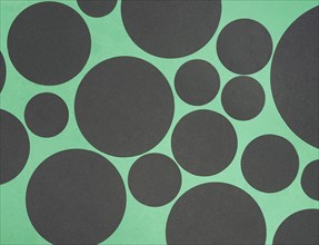 Black design circle shape green background