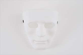 Big white carnival mask table
