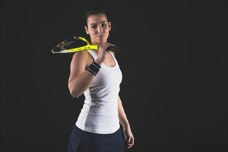 Professional player with racket shoulder