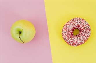 Top view donut vs fruit