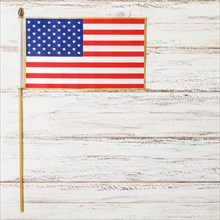 Small usa flag independence day white wooden desk
