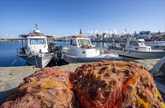 Fishing nets and boats in Naoussa harbour
