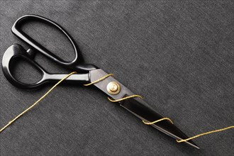 Scissors with thread top view