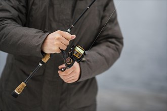 Man using fishing rod