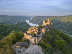 Drone shot of Aggstein Ruin at sunrise with Danube