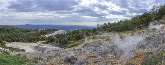 Panorama of the Biancane Geothermal Park with the cooling tower of the power plant