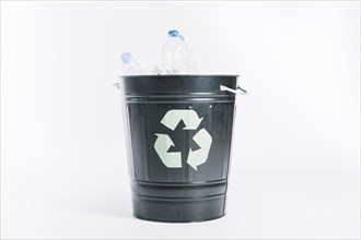 Recycle bucket with plastic bottles white background