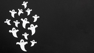 Top view creepy halloween ghosts with copy space