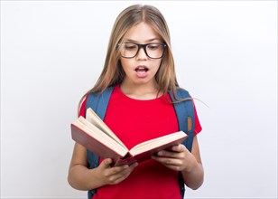 Shocked schoolgirl with book