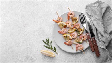 Fresh seafood shrimp skewers cutlery