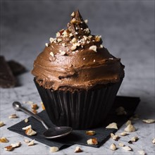Close up tasty chocolate cupcake