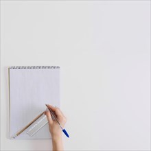Crop student blank notepad