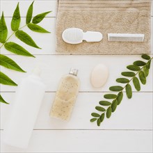 Skin health accessories table with green leaves