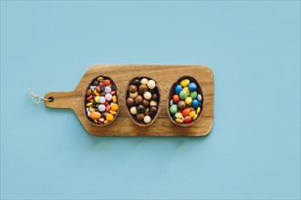 Chocolate eggs with pellets board