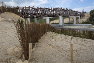 The wooden footbridge Het Wrakhout at Westende