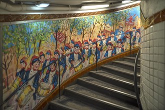 Staircase in the Metro station Abbesses decorated with a painting