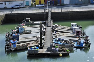 Oyster farming boats in the harbour at Le Chateau-d'Oleron on the island Ile d'Oleron