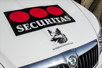 Vehicle with logo of the Securitas K9 Explosive Detection Team which works with explosive-detection dogs