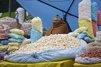Bags with popcorn on sale at market in Copacabana