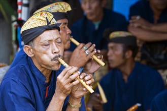 Flute player at funeral service