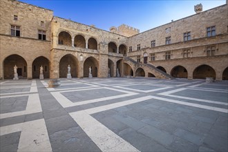 Inner courtyard surrounded by arcades with statues from Hellenistic and Roman times