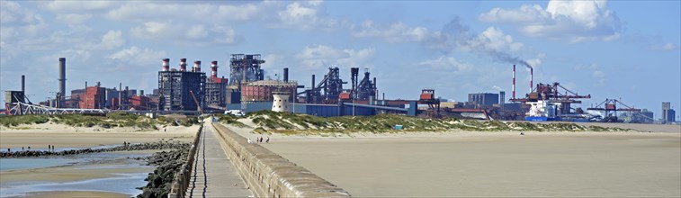 View over heavy industry seen from the beach at Dunkirk