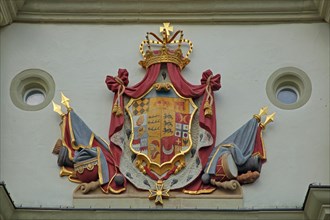 Historical coat of arms with crown and ornaments at the Teutonic Order castle