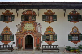 Entrance and facade with Lueftl painting at the town hall and registry office in Ruhpolding