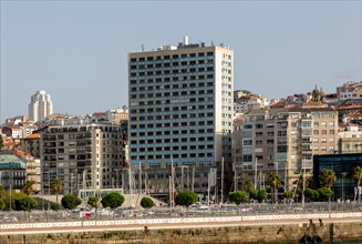 Hotel Bahia de Vigo building and sailing yachts in marina