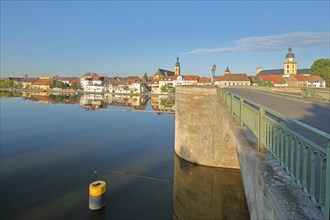 View from the historic Old Main Bridge onto the townscape with St. John's Church and the Protestant Town Church Bridge pier