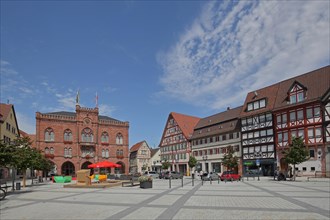 Market square with town hall and on the right Thurn- und Taxissche Post building and historic half-timbered houses
