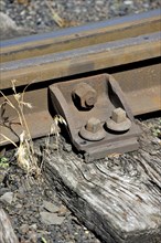 Railroad tracks on wooden sleepers at the depot of the Chemin de Fer a Vapeur des Trois Vallees at Mariembourg