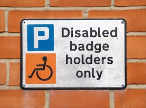 Disabled badge Holders Only parking sign