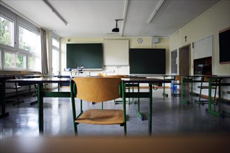 Chairs in a classroom as schools begin to prepare for a return to teaching full classes in September. Bavaria