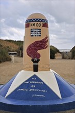 The WW2 milestone 00 marker near the Utah Beach Landing Museum