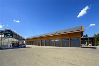 Garden centre and large warehouses with solar modules