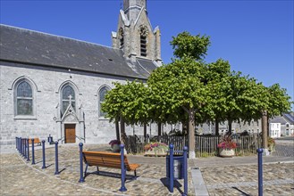 St. Jean the Baptist Church and centuries old linden tree