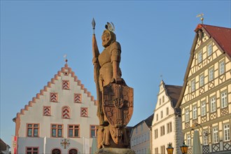 Milchling fountain with sculpture of Grand Master Wolfgang Schutzbar alias Milchling of the Teutonic Order as knight with coat of arms