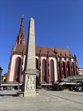 Gothic Lady Chapel on the market square with fountain obelisk